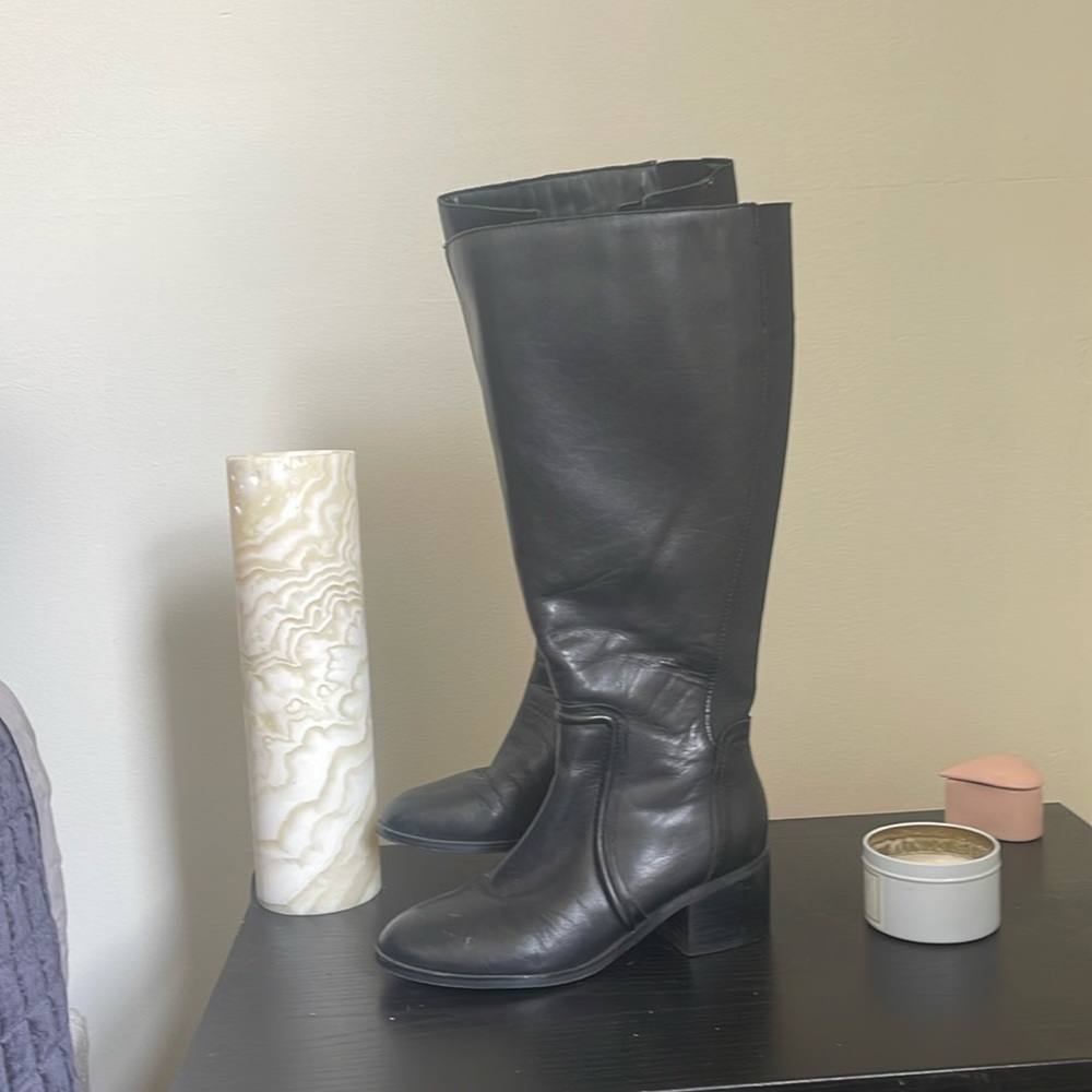 Black tall boot